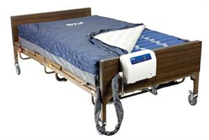 Med Aire Bariatric Heavy Duty Low Air Loss Mattress Repl System rated up to 750lbs. Whisper quiet pump produces 15-lpm in air flow. LED and Audible low pressure alarms, mattress has 20 air bladders, quick fill adapter, 20 second deflation. 